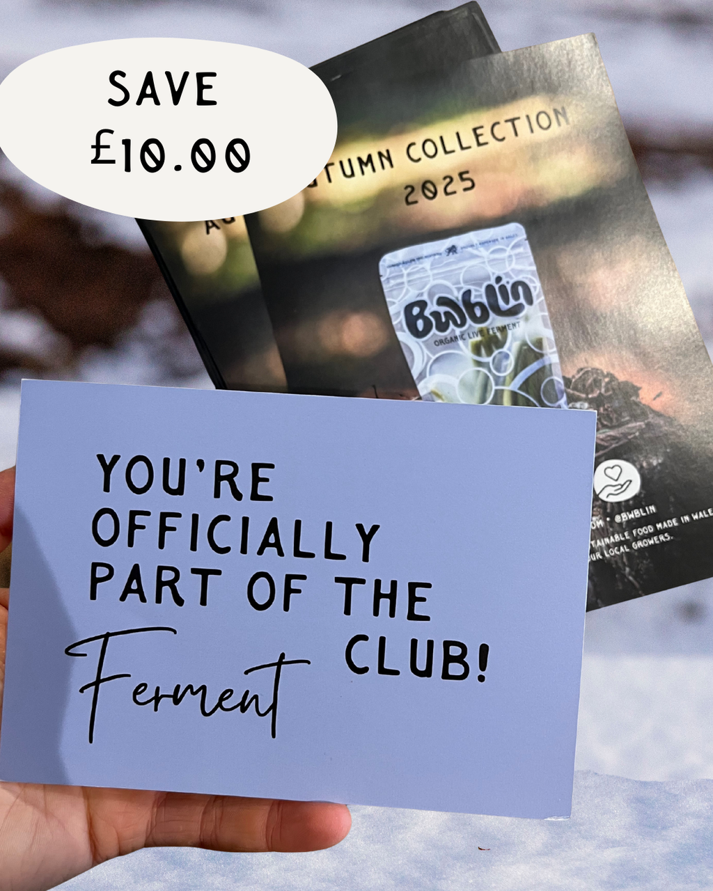 Promotional card with text 'You're officially part of the Ferment club!' held over a blurred product image.