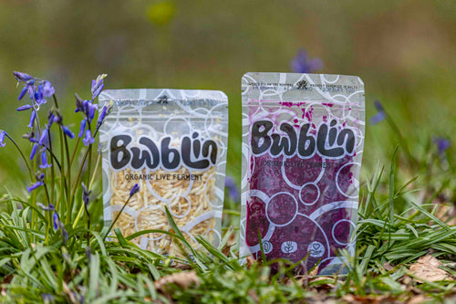Two bwblin pouches together in the spring  landscape